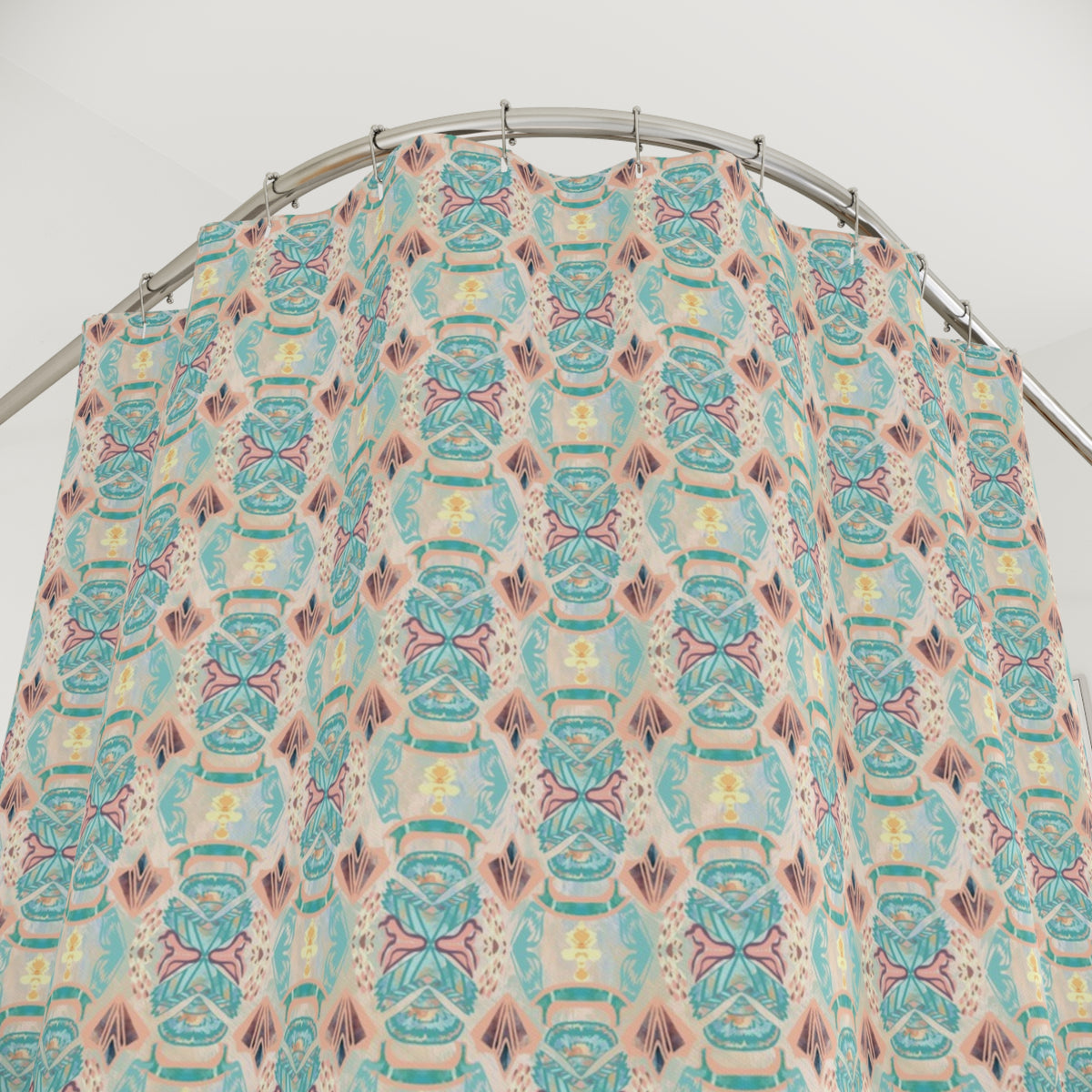 Patterned fabric on a metal rod against a white background